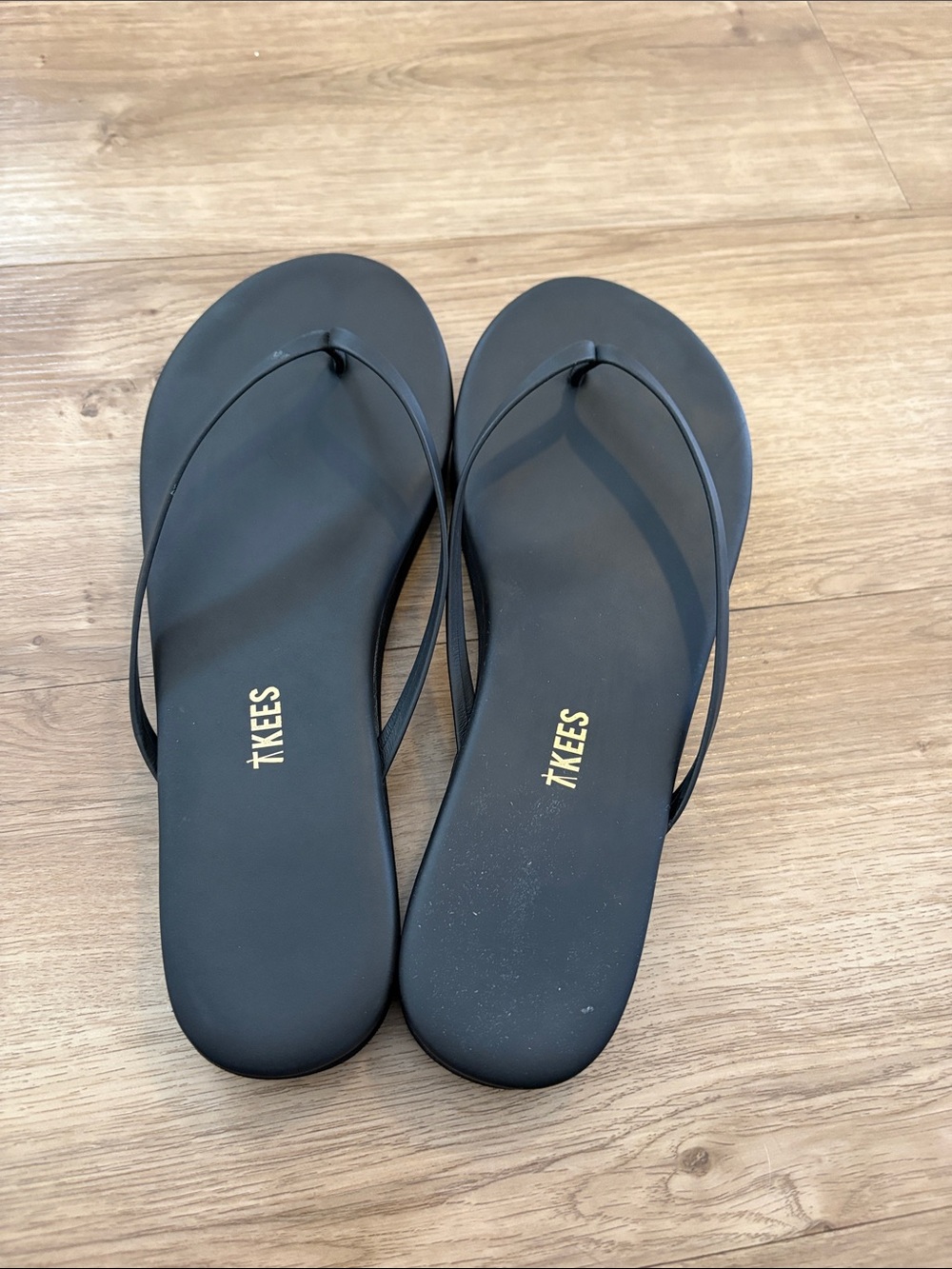 EUC Tkees flip flops- Size 11